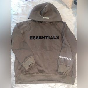 Essentials sweatshirt. Size medium. A greyish color. Never worn!!